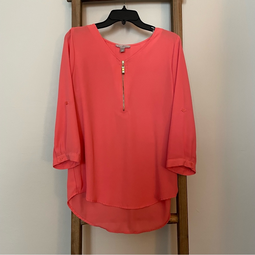 Pink, silky blouse
